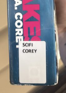 A closeup of the spine on the book "Leviathan Wakes," focusing on the spine label. The spine label reads "SCIFI COREY."