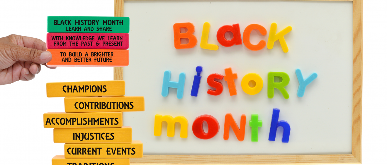 Fridge magnets spelling Black History Month with building blocks displaying values